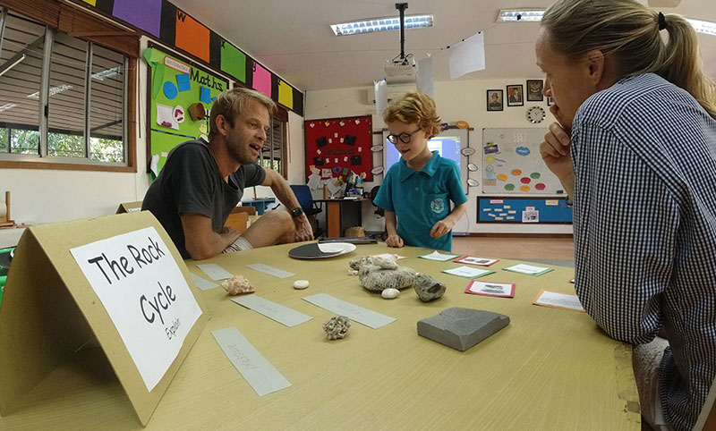 Children at The Rock Cycle table